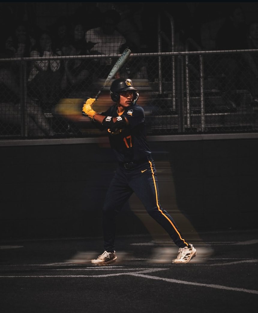 Eastwood Troopers batter at the plate under the lights